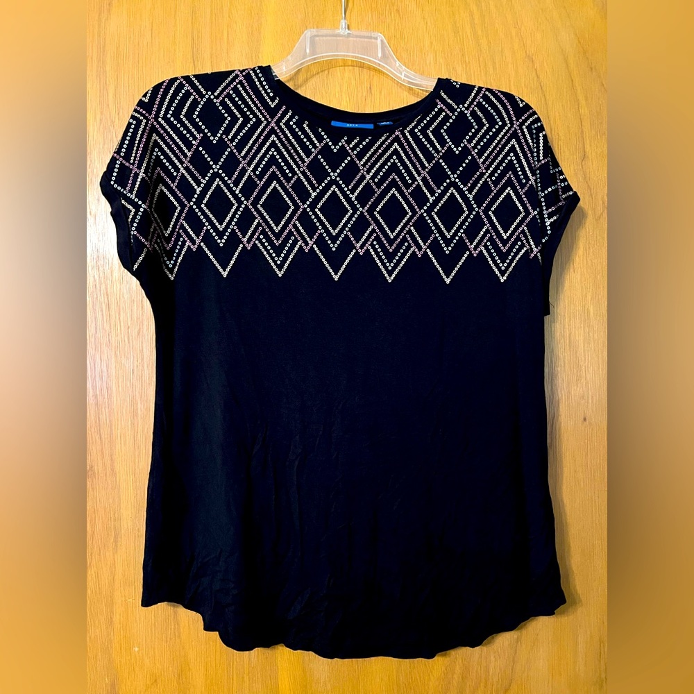 Black fashion knit top with sparkly metallic print on front side